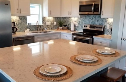 San Luis Casa | Relax and enjoy water views of the Gulf and beautiful home so near the beach!