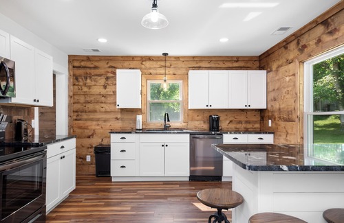 Bentonville Casa | Relax and Unwind at River Front Oasis w/ Hot Tub