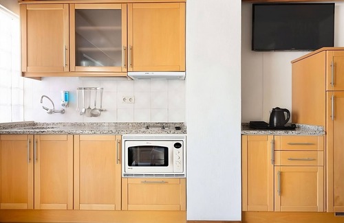 Areias de Sao Joao Hotel | Relax and Unwind! Full Kitchen, 2 Swimming Pools, Stay Close to Oura Beach!