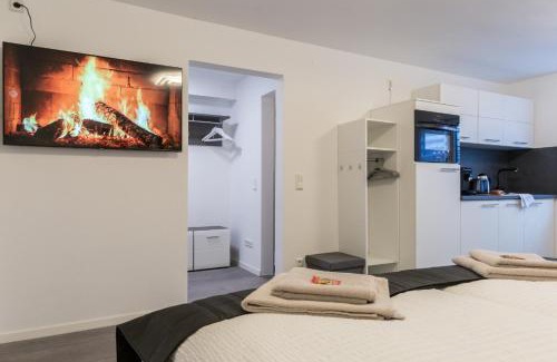 Bergerhausen Apartamento | Relax-Apartment 2 mit Massagesessel, Smart-TV und Küche