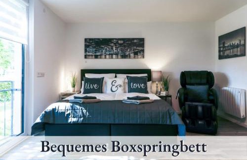 Bergerhausen Apartamento | Relax-Apartment Biberach - Relax Massagesessel - Smart-TV 85 Zoll - voll ausgestattete Küche - High-Speed Internet - Arbeitsplatz mit Curved Monitor