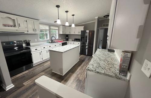 Bracey Casa | Relax at this Golf Community House with nearby water access!