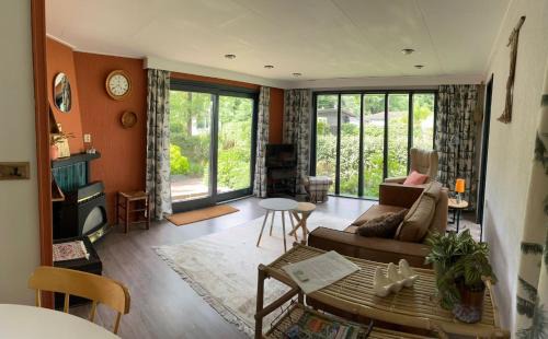 Krachtighuizen Chalet De Esquí | Relax Chalet Veluwe