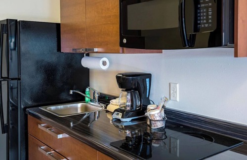 West Valley City Hotel | Relax in a Room with Kitchen Close to Salt Lake Attractions! Pets Allowed!