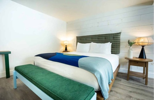 Stowe Area Hotel | Relax in a Spacious Room Surrounded by Nature! Outdoor Pool!