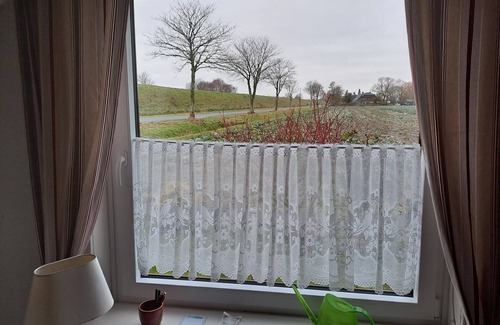 Friedrichskoog Condominio | Relax in the iodine-rich North Sea air in the first floor apartment Deichblick