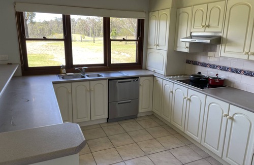 Woodlands Casa | Relaxed acreage 5 minutes from the beach.