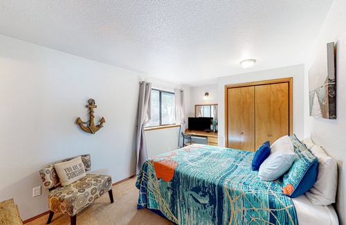 Belfair Casa | Relaxing bay front house with mountain views, lovely deck, wood-stove & firepit