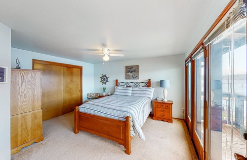 Belfair Casa | Relaxing bay front house with mountain views, lovely deck, wood-stove & firepit