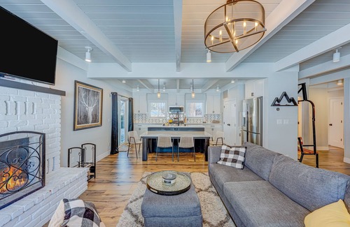 Tahoe Island Casa | Relaxing dog-friendly home with fireplace, hot tub, patio, game room, & W/D