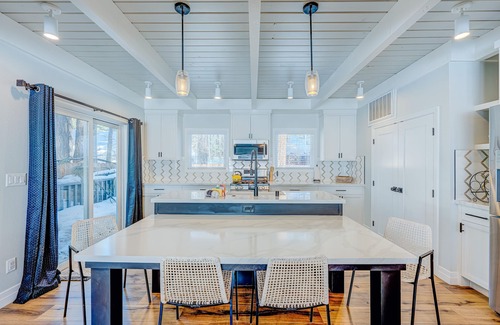 Tahoe Island Casa | Relaxing dog-friendly home with fireplace, hot tub, patio, game room, & W/D