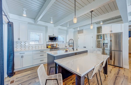 Tahoe Island Casa | Relaxing dog-friendly home with fireplace, hot tub, patio, game room, & W/D