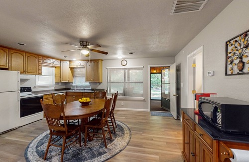 Kingston Casa | Relaxing escape on a large lot with a washer/dryer, sunroom, & firepit