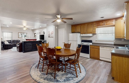 Kingston Casa | Relaxing escape on a large lot with a washer/dryer, sunroom, & firepit