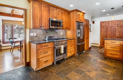 Broadmoor Casa | Relaxing Home with Private Hot Tub, Fast WiFi, Gas Fireplace, and Washer/Dryer