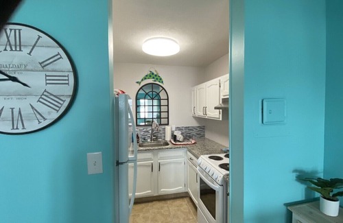 El Centro Beach Condominio | Relaxing Studio short walk to beach! Free round of Golf & Activities Daily!