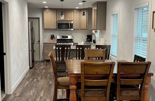 Edgerton Casa | Remodeled home with pontoon rental 2 decks Private beach playground volleyball