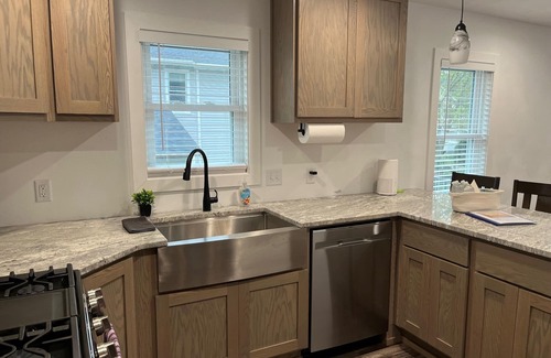 Edgerton Casa | Remodeled home with pontoon rental 2 decks Private beach playground volleyball