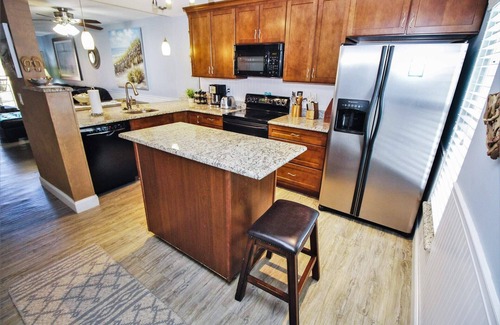Point East Condominio | Renovated Beach Condo with Views of Non-Driving Beach and Pool!