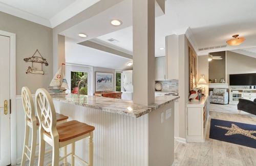 Lawton Woods Casa | Renovated coastal Sea Pines beach home with a private pool