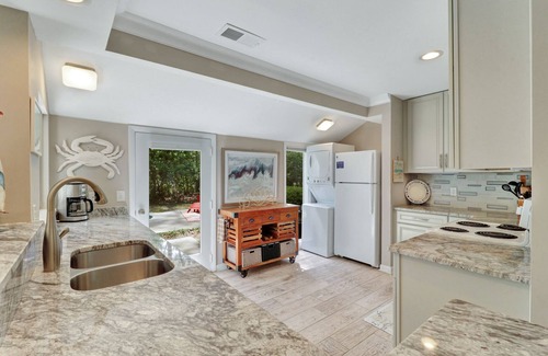 Lawton Woods Casa | Renovated coastal Sea Pines beach home with a private pool