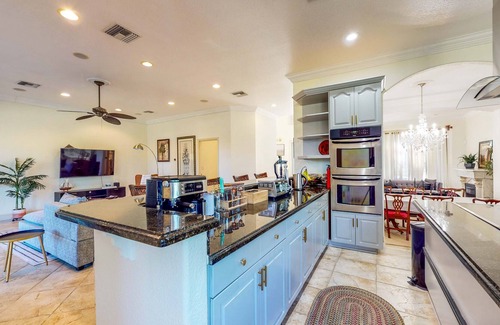 Loxahatchee Casa | Renovated, elegant retreat with a fitness room, work desks, large deck, & W/D