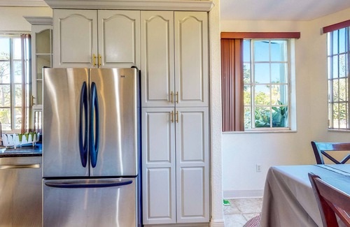 Loxahatchee Casa | Renovated, elegant retreat with a fitness room, work desks, large deck, & W/D