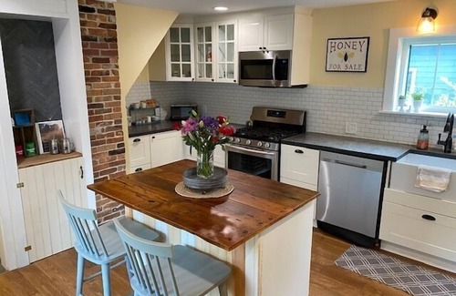 Kennebunk Casa | Renovated farmhouse featuring two connected rental units with an interior access door. Large Yard