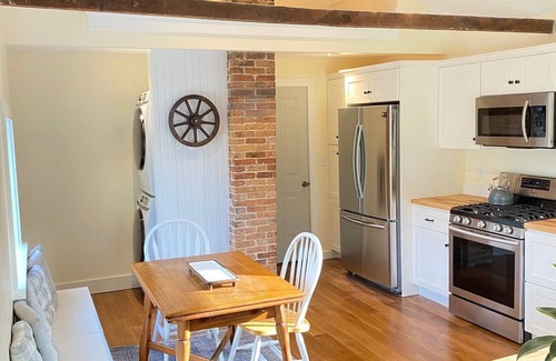 Kennebunk Casa | Renovated farmhouse featuring two connected rental units with an interior access door. Large Yard