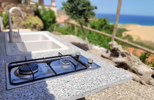 Torre dei Corsari Apartamento | Renovated house overlooking dunes and pristine sea.