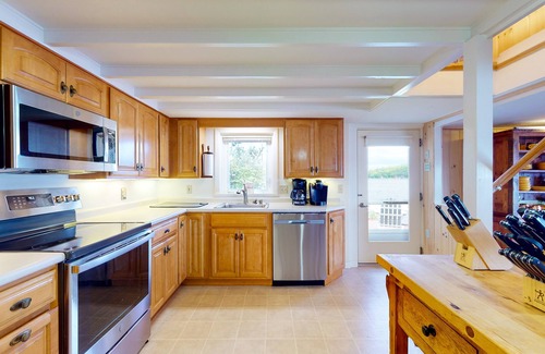 Alton Bay Casa | Renovated home with a water view, washer/dryer, AC, deck & wood stove