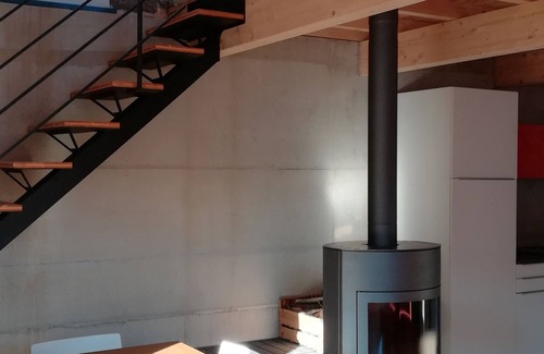 Burzet Casa | Casa de piedra reformada de forma contemporánea.