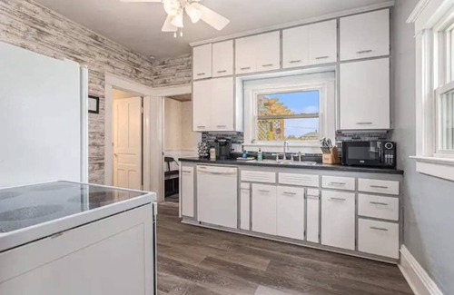 Three Oaks Casa | Renovated Victorian Home with Private Garden & Fire Pit!