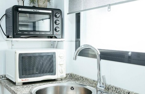 Los Remedios Apartamento | RentalSevilla De paseo por los Remedios
