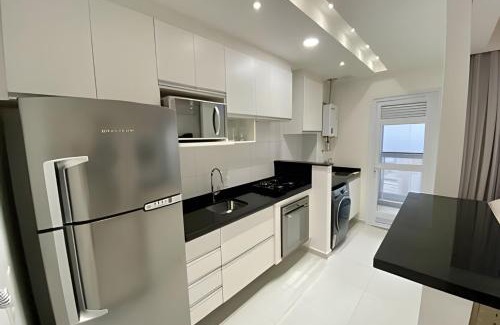 Gonzaga Apartamento | Requinte, vista mar, sauna e piscina!