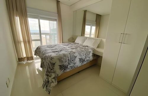 Gonzaga Apartamento | Requinte, vista mar, sauna e piscina!