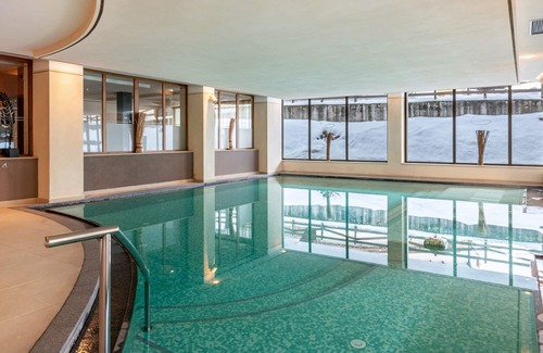 San Giovanni di Fassa Apartamento | "Residence Anda Appartamento 42" with Views of the Dolomite Peaks, Shared Indoor Pool & Jacuzzi