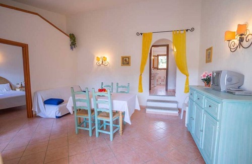 Baia Sant'Anna Apartamento | Residence Baia Sant'Anna with swimming pool and two bathrooms BudoniRentals