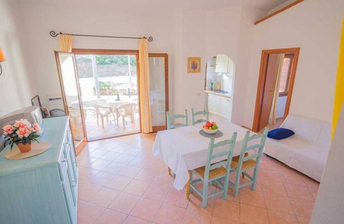 Baia Sant'Anna Apartamento | Residence Baia Sant'Anna with swimming pool and two bathrooms BudoniRentals