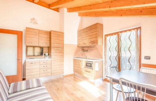 Ledro Apartamento | Residencia Toli apartamento de dos habitaciones con piscina exterior climatizada todo el año