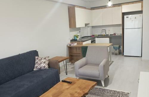 Bayraklı Apartamento | Residence with pool and sea view