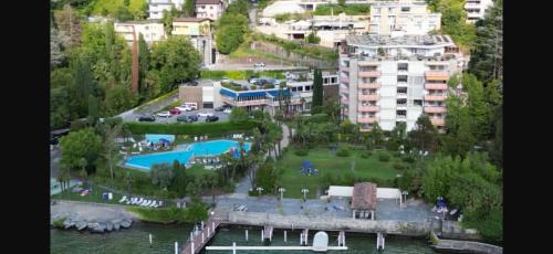 Bissone Apartamento | Residenz am Luganersee mit Pool
