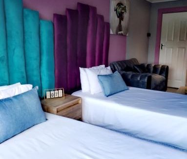 Secunda Cama Y Desayuno | Reutlwane Gardens B&B