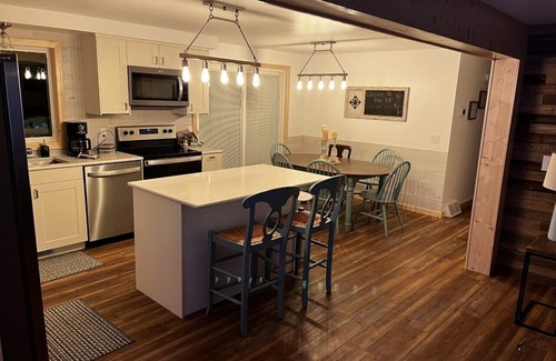 Iron River Casa | Ride your ATVs and snowmobiles directly from the house!