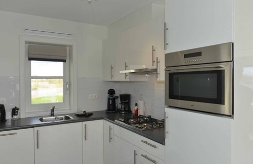 Zuideinde Apartamento | Rietburghaus N5 04, water and nature park, at least 7 days - Rietburghaus