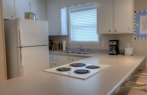 Bahama Beach Cabaña | BABY BAHAMA SUPERIOR CASA, Frente a la playa, 2 a 6 personas, 2 Bd 2 Ba, cubierta extra grande