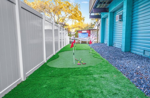 Weeki Wachee Gardens Casa | River home with huge arcade, hot tub kayaks, mini golf and floating pad, 80in TV