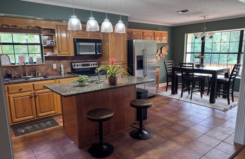 D'Iberville Casa | River house Biloxi sleeps 12 huge outdoor entertainment area with life size game