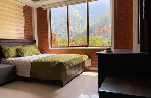 Baños de Agua Santa Casa | River House II