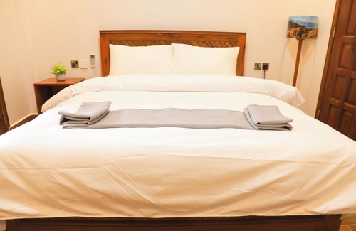 Arusha Hotel | River House Lodge